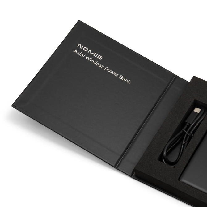 A black power bank housed in a sleek box, featuring a USB cable and branding.