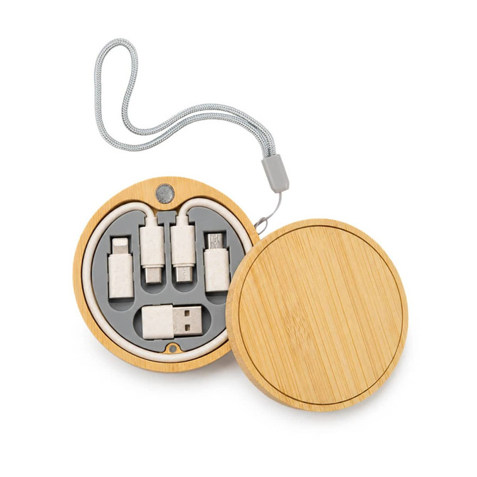 A circular bamboo set containing various USB charging cables tucked inside a grey holder, featuring a strap.