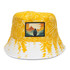 A yellow bucket hat featuring a full colour patch and a design with white mountain-themed illustrations.