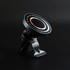 A black wireless car charger with a circular design and a clip mount. It features a ring of bronze accents.