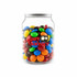 A clear jar filled with colourful M&M's in various shades, including red, blue, green, yellow, and brown.