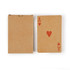 A deck of recycled playing cards in a brown cardboard box, featuring a red Ace of Hearts on top.