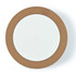 A wireless charger with a round cork exterior and a smooth white charging surface.