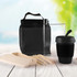 A black picnic bag contains a drink bottle, a takeout container, utensils, and a black reusable cup.