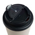 A reusable coffee cup in a light color with a black comfort lid and a small opening for sipping.