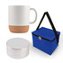A coffee cup with a cork base, a small Bluetooth speaker, and a blue insulated carrying bag.