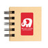 A spiral-bound notebook with a kraft cover featuring a white elephant logo and the text "WILD TUSK DEFENDERS."