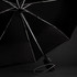 A black umbrella with a sleek design and a handle featuring a logo. The canopy is open, revealing its structure.