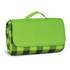 A green picnic blanket featuring a checkered pattern, neatly rolled and secured with a handle.