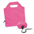 A pink reusable grocery bag that folds into a small pouch for easy storage. It includes a drawstring closure.
