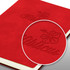 A Genoa Soft Cover Notebook in bright red featuring an embossed hibiscus design and the word "Hibiscus."