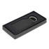 A black square leather key ring presented in an elegant black box with a soft interior.