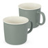 A drink mug set in muted green with cream interior, featuring a simple handle and a smooth finish.