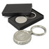 A drink bottle opener key ring in silver, presented in a black box, featuring an engraved logo.