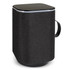 A rectangular black Bluetooth speaker with a textured exterior and a handle, featuring a sleek black top.