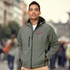 A man wearing a green softshell jacket with a zipper, featuring a logo on the chest and a hood.