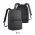 A black gym bag with padded straps and a front pocket, featuring a sleek, minimalist design and a logo.