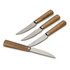 A set of four steak knives with stainless steel blades and wooden handles. Each knife features a serrated edge.