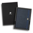 A navy notebook with a clasp, presented in a black gift box, featuring branding. Perfect for office use.