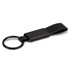 A black key ring featuring a sleek metal attachment and a leather strap. It includes a branding logo.