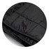 A black puffer blanket with a quilted texture, featuring a smooth, shiny surface and folds. Includes branding.