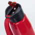 A red aluminium drink bottle with a black lid and a straw, featuring a carry strap and a logo.