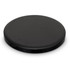 A round black wireless charger with a sleek design, featuring a USB port.