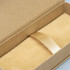 A kraft gift box with a soft interior and a gold ribbon, suitable for pen packaging.