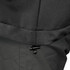 A close-up of the hem and adjustment toggle of a black soft shell men's jacket. The fabric texture is visible.