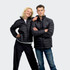 A black unisex puffer jacket displayed on two models standing confidently, both wearing casual outfits.