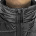 A black puffer vest with a high collar and zip closure, featuring a subtle logo on the fabric.
