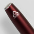 A metal pen with a deep red finish, featuring a shiny silver tip and a recycling logo.