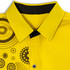 A bright yellow button-up men's shirt featuring a decorative pattern on one side and a black collar.