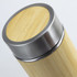 A drink bottle with a bamboo exterior and a stainless steel lid, features a sleek and natural design.