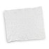 A small, compressed white towel with a textured surface, featuring a logo.