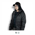 A black Swiss Peak Urban Puffer Jacket worn by a woman, paired with a black cap. The jacket features a logo.