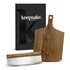 A wooden cheese board and knife set, featuring a stainless steel blade, packaged in a sleek black box with a logo.