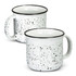 A ceramic mug in white with black speckles, featuring a simple handle and a black rim. Two mugs are displayed.