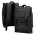 A black Trek Soft Touch Backpack with adjustable straps and a flap closure, featuring a logo on the front.