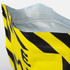 A large foil flat bottom pouch with a striking yellow colour and a black graphic design, featuring a zippered top and a logo.