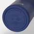 A drink bottle with a navy blue exterior, made of stainless steel, featuring a branding logo on the bottom.