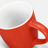 A red coffee mug with a matte finish and a white interior, featuring a handle and a branding logo.