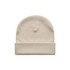 A cream-coloured cuff beanie with a simple, rolled cuff design and a logo.