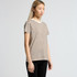 A striped T-shirt in brown and cream, featuring a casual fit and a logo on the front.