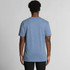 A plain faded blue t-shirt viewed from the back, featuring short sleeves and a relaxed fit.
