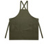 A dark green apron with cross-back straps and a front pocket, featuring a logo.