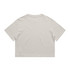 A heavy faded crop tee in a neutral beige colour, featuring short sleeves and a relaxed fit. The garment has a logo.