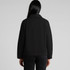A black canvas chore jacket displayed from the back, featuring a collared neckline and a subtle logo.