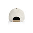 A two-tone camo cap featuring a cream and khaki colour scheme with an adjustable strap in the back.
