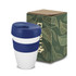 A drink bottle with a white body and navy blue silicone band and lid, accompanied by a decorative box.